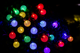 Colorful string lights on a dark background